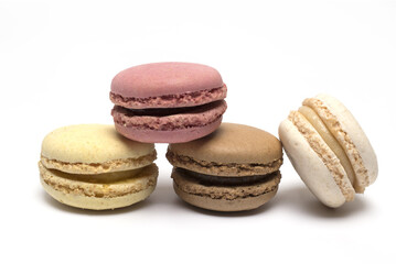 Closeup several different colored macaron white background