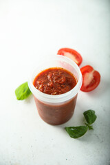 Traditional homemade tomato sauce with basil