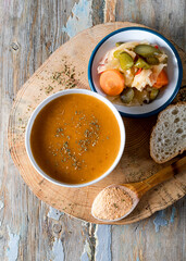 Traditional Turkish tarhana soup on the wooden background.