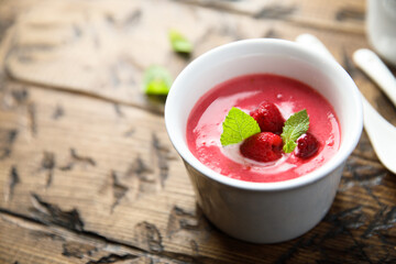 Refreshing cold raspberry soup with fresh mint