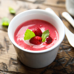 Refreshing cold raspberry soup with fresh mint