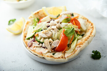 Fresh Greek pita bread with chicken and vegetables