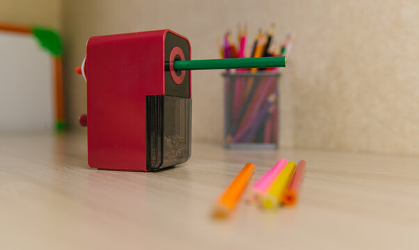 Mechanical pencil sharpener on the table. preparation of school stationery for study.