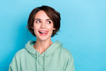 Photo of pretty millennial bob hairdo lady look promo wear green pullover isolated on blue color background - obrazy, fototapety, plakaty