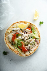 Fresh Greek pita bread with chicken and vegetables
