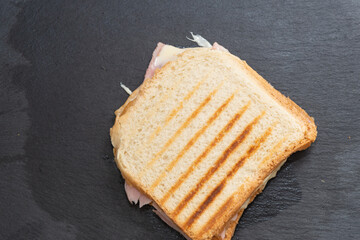 Toast with cooked ham and cheese
