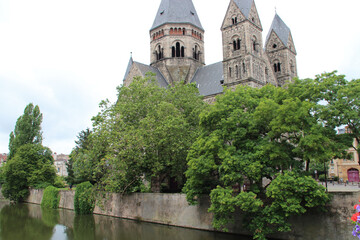 protestant church (temple neuf) and moselle river in metz (france) 
