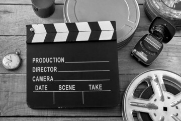 Clapperboard and other film equipment. Black and white photo - 481369724
