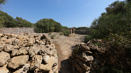 Fototapeta na wymiar Aljibe de Poblado Talayótico de Torretrencada,. Menorca, Islas Baleares, España