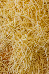 Classical dry italian pasta noodles close up