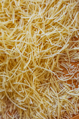 Classical dry italian pasta noodles close up