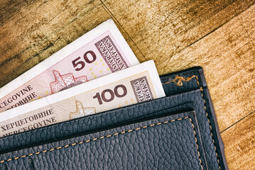 wallet with  bosnian convertible mark paper money. Macro photo