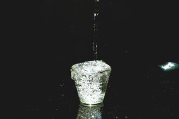 Obraz na płótnie Canvas Photography of frozen moving liquids, water 