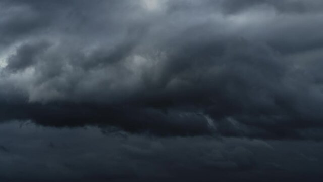 beautiful dark dramatic sky with stormy clouds time lapse before the rain or snow, winter season

