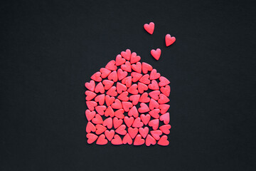 Many red hearts in the form of house. Home sweet home concept. Valentine's day.