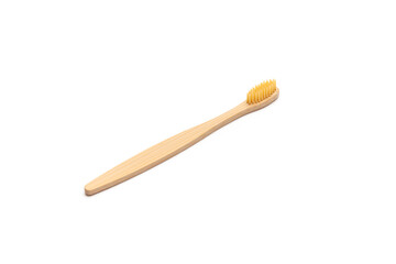 Toothbrush made of bamboo isolated on white background. Plastic free.