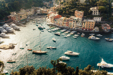 Liguria, Italy, Europe.  View from above over beautiful Portofino with colorful houses and villas, ...