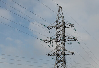 Electrical poles and lines, high voltage towers in a beautiful sky. High voltage transmission...