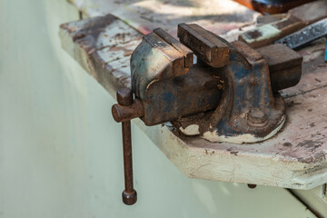 Old locksmith vise on a workbench
