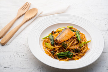 Fusion food.Spaghetti with Tomato Cream Sauce and Canned Mackerel