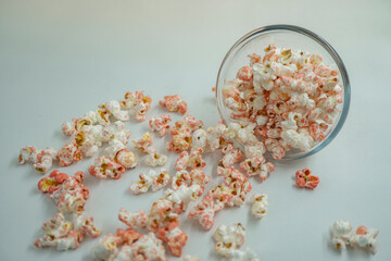 Close up of pop corn on the bowl with negative space.  That photos is perfect for food pamphlet, product poster, product promotion and ads.