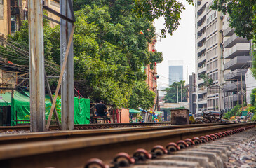 Naklejka premium Life on a railway track in the middle of the city of Bangkok Thailand Asia