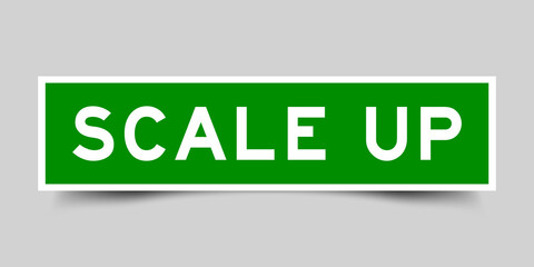 Square label banner with word scale up in green color on gray background