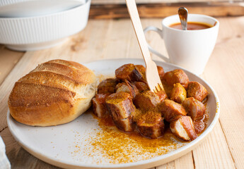 Traditional german currywurst with bun