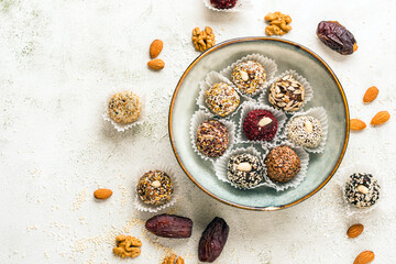 Vegan candies made from nuts and dried fruits. Energy ball. copy space - 481385934