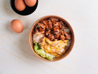 Chicken Don with rice, egg served in japanese style food set top view on grey background