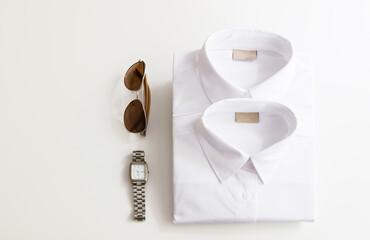 casual outfits with accessories on white background.
