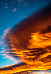 Obraz premium A golden swooping cloudy weather front portrait blowing in over the Mediterranean coastline of Marbella