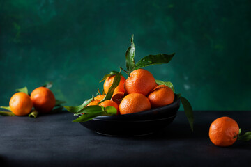 Fresh mandarins with green leaves