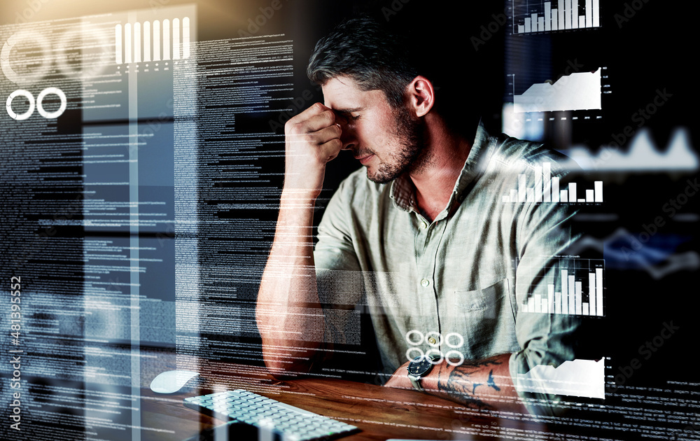 Poster He's just too overwhelmed. Shot of a programmer looking stressed out while working on a computer code at night.