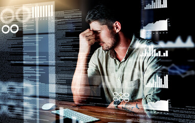 He's just too overwhelmed. Shot of a programmer looking stressed out while working on a computer...