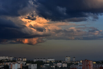 Thunderclouds on a dramatic stormy sky over the city