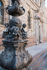 Obraz premium Close-up sculpture of a little angel on street lamp near Stieglitz State Academy. Architect M.E. Mesmakher.