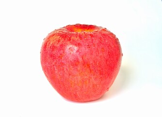 red apple with water drops