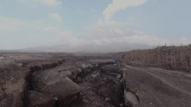 The scenery on the slopes of mount Semeru after eruption in Lumajang, East Java, Indonesia | Cinematic Aerial Footage in 4K 