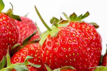 beautiful and ripe red strawberries on a white background