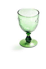 Green glass goblet with high relief, isolated