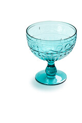 Blue - green glass goblet with high relief, isolated