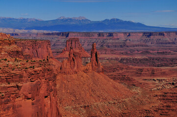 Washer Woman, Monster Tower, Airport Tower and the La Sal Mountains seen from Mesa Arch, Canyonlands National Park, Moab, Utah, Southwest USA