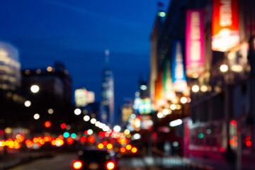 Blurred night lights of a New York City street scene at Chelsea Piers in Manhattan