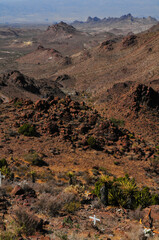 Memorials on the harsh desert terrain by the side of the Historic Route 66 around Sitgreaves Pass,...