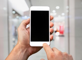 Online shopping concept. Hands holding mobile phone