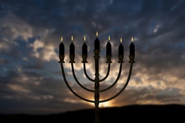Burning wax festive candles are traditional symbols of Hanukkah Holiday