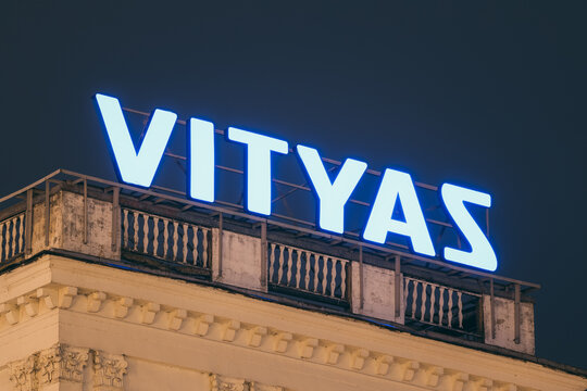 Vitebsk, Belarus. Logo Logotype Signboard Of Vityaz On Roof Of Building. Belarusian Company That Makes Televisions And Home Appliances