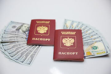 two Russian passports and one hundred dollar bills