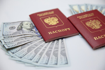 two Russian passports and one hundred dollar bills